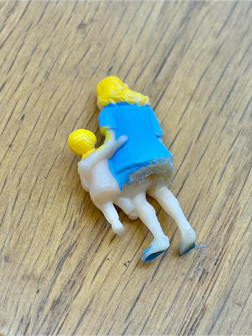Vintage Plastic Celluloid Painted Woman Holding Child Figure Sitting Trinket 1”